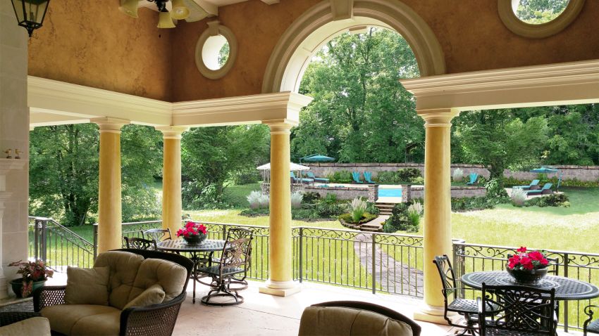 Custom designed loggia Venetian plaster columns with faux stone capitals and base and upper wall O’villa plaster finish pool