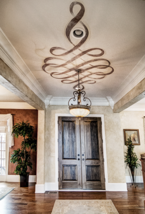 European plaster walls with a hand painted metallic Modello ceiling fresco.